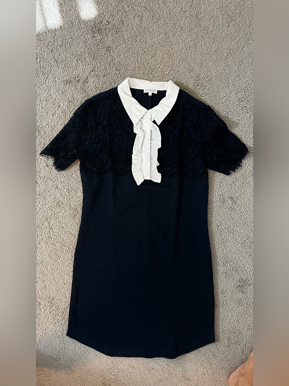 Chic Navy Lace Mini Dress with White Ruffle